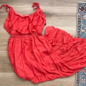 High low tangerine sleeveless Flutter dress